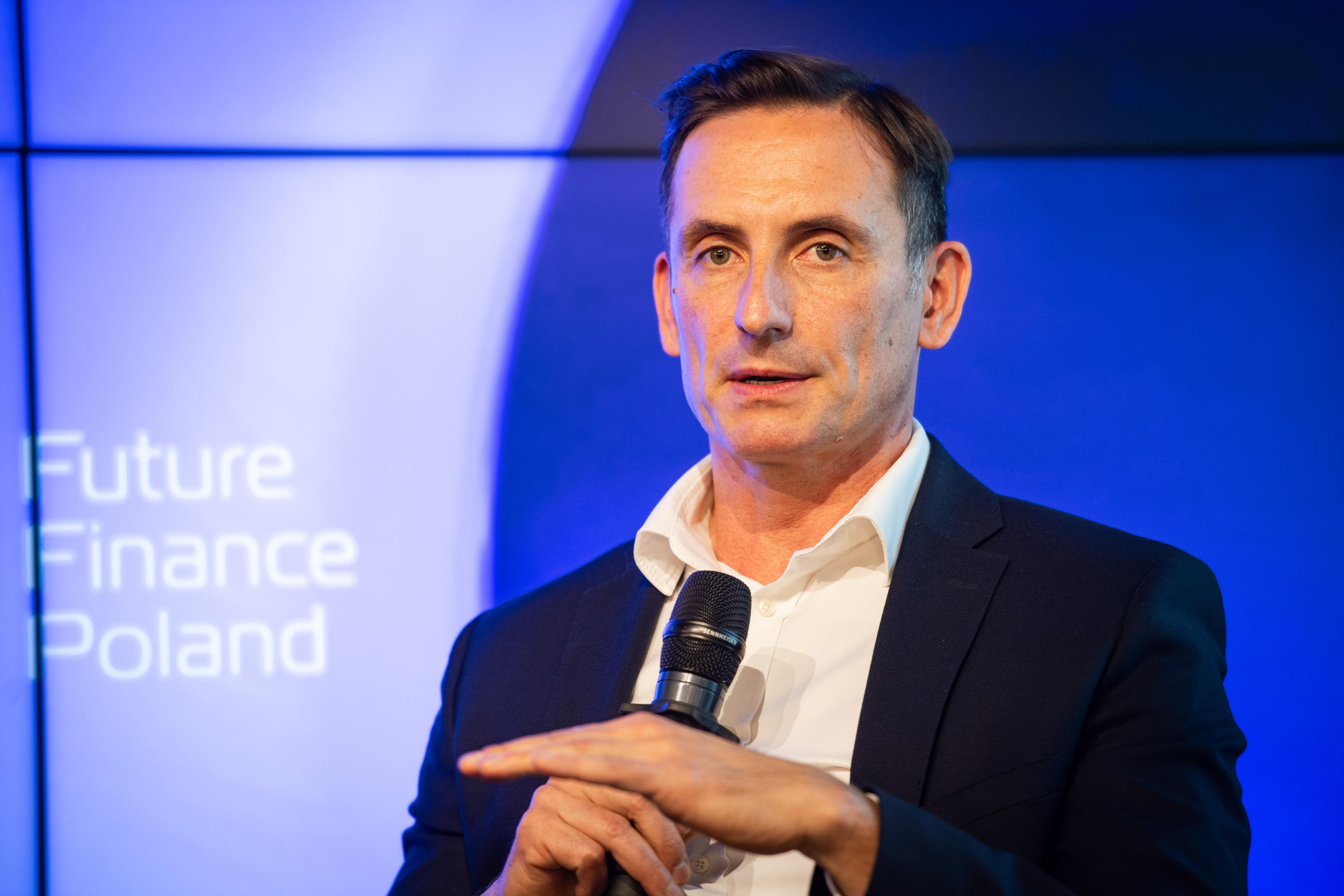 Dariusz Adamski with microphone