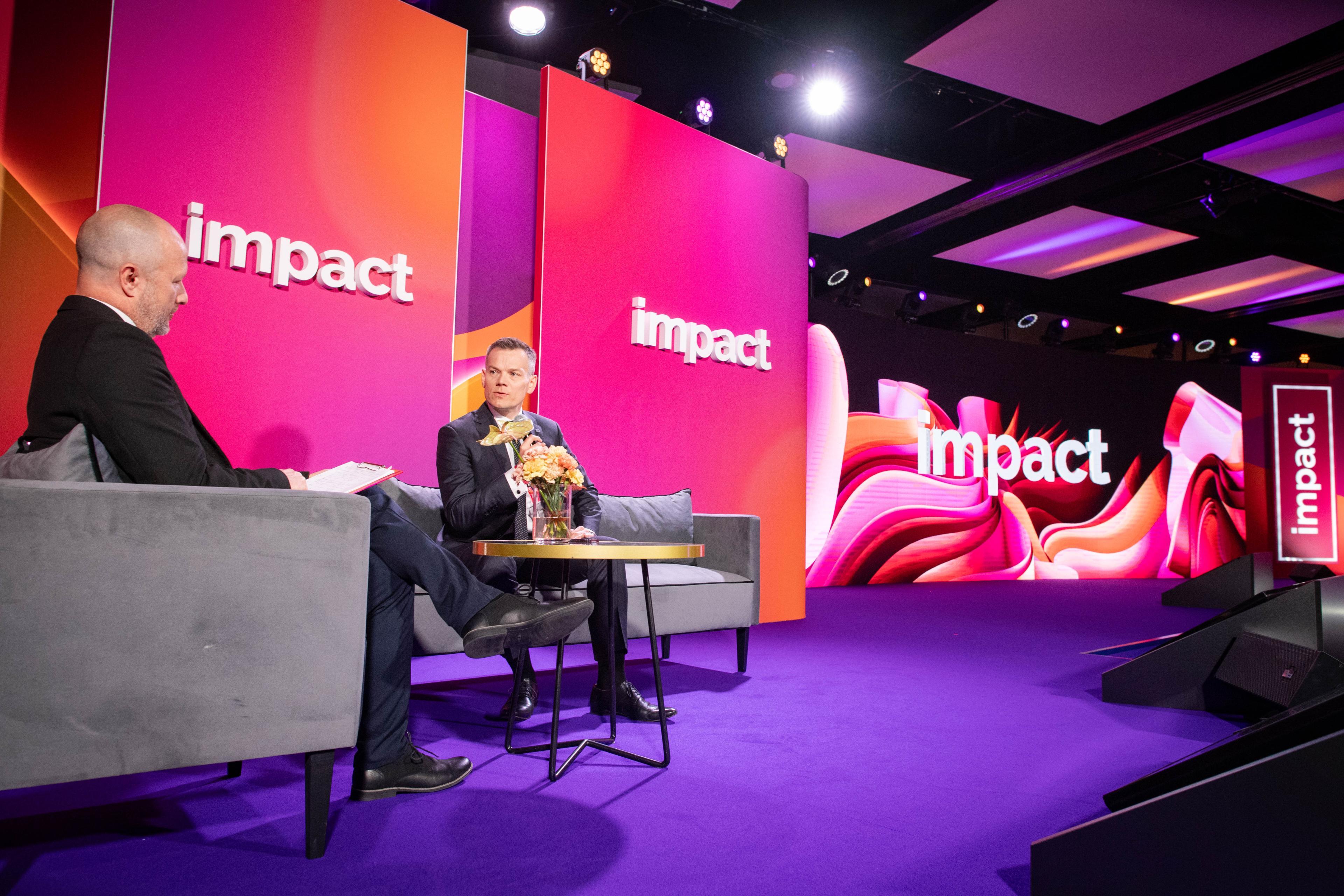 Jacek Jastrzębski speaks on stage