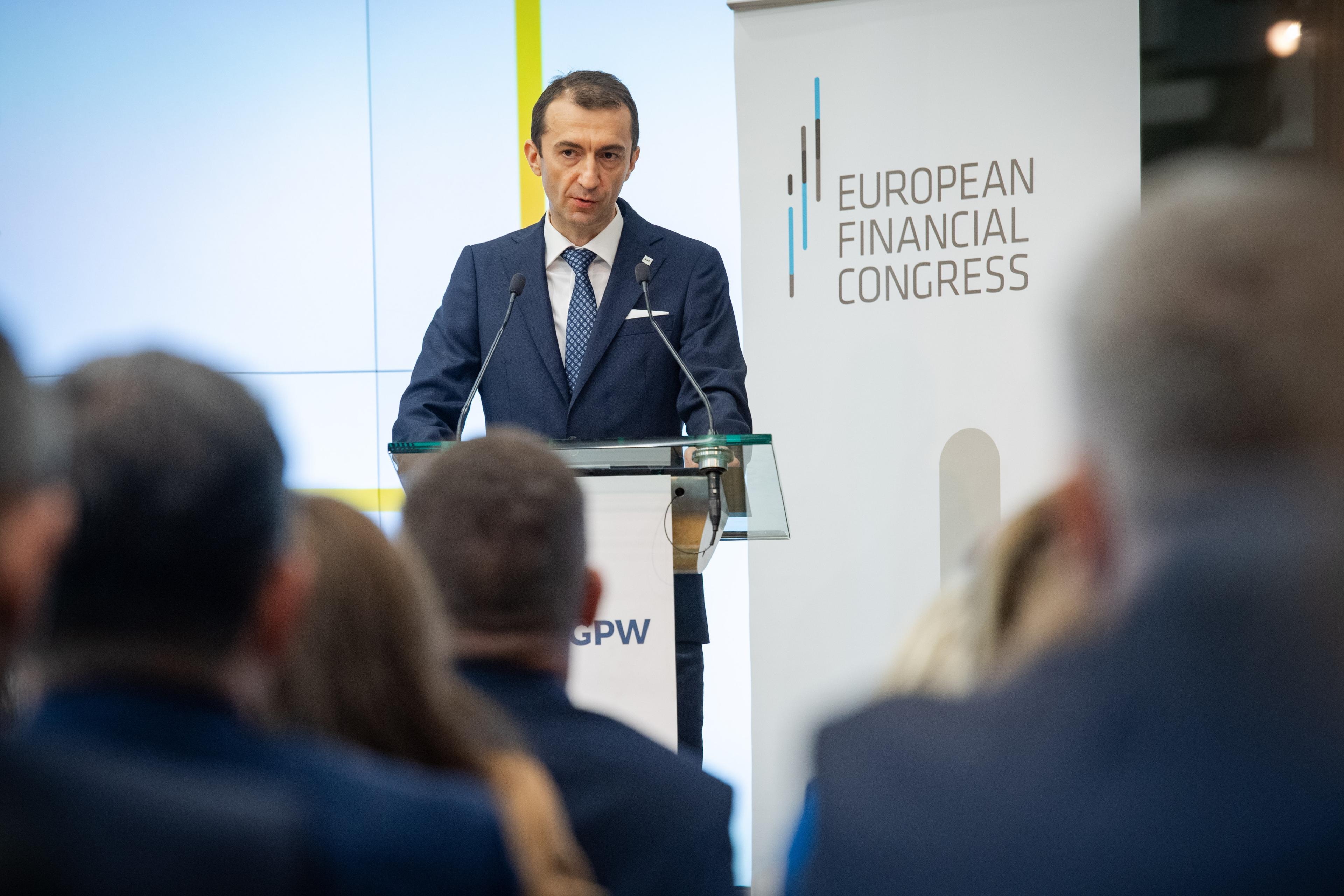 Krystian Wiercioch speaks on stage